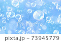 Soap bubbles underwater light blue background loop 73945779