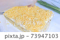Cooking a snack fish cake with cheese 73947103