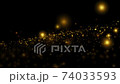 Abstract background with golden particles flow on black. Sparkling magical lights explosion.  74033593