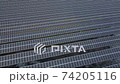 Renewable Energy and Sustainable Development. Photovoltaic Solar Panels. aerial view Grid of solar panels 74205116