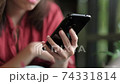 Closeup of woman talking on mobile phone. 74331814