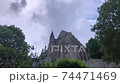 Medieval walls of Abbey. Mont Saint-Michel - rocky tidal island in Normandy  74471469