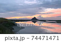 Mont Saint Michel. Timelapse over beautiful sunset sky. 74471471