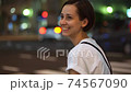 Women in the crowd (night, cityscape, city) 74567090