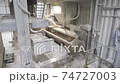 Manufacturing or production of plaster or gypsum mix. Apparatus or machine mixer for kneading or mixing gypsum and water in the factory or plant 74727003