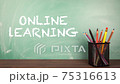 ONLINE LEARNING. School classroom with green chalk board 75316613