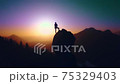 Climber Launches Rope from Top of the Summit. After climbing the mountain Climber Launches Rope from Top of the Summit. After climbing the mountain 75329403