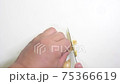 Men's hands chopping ginger 75366619