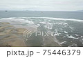 aerial shot of the coming tide at an estuary entrance 75446379
