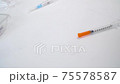 doctors hands in gloves take vials with coronavirus vaccine and syringe 75578587