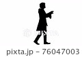 Silhouette Man dressed like Mozart conducting while walking. 76047003