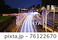 東京タイムラプス 代官町から眺める千鳥ヶ淵方面の首都高速都心環状線の自動車の光跡と夜景 76122670