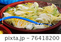 washing cabbage to make kimchi. 76418200