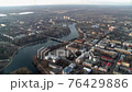Aerial video of a town district and river 76429886
