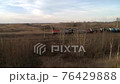 Fly over spring forest near freight train 76429888
