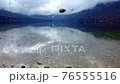 The stone are dropping in the water. Slow motion 76555516