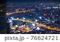 time lapse aerial view of Victory monument, famous landmark center of Bangkok city, Thailand, at night and heavy traffic jam transportation at roundabout and on highway, motorway, tollway abusiness 76624721