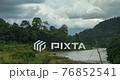 Landscape timelapse of the Tembeling River and surrounding jungle, on a stormy day, in Malaysia National Park, also known as Taman Negara Malaysia, the oldest tropical rainforest in the world. 76852541