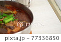 Eating pig intestine with duck blood. Taiwanese traditional spicy hot pot soup named - Wu Geng Chang Wang. 77336850