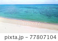 [Drone aerial view] Aerial view from the white sand beach of Okinawa toward the blue sea 77807104