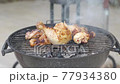 Barbecue Chicken meat is roasted on the grill 77934380