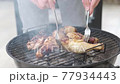 Barbecue Chicken meat is roasted on the grill  77934443