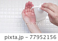 Disinfect with alcohol disinfectant spray. Measures against the new coronavirus, COVID-19. 77952156