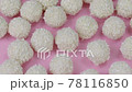 delicious handmade chocolates decorated with shiny coconut chips rotating 78116850