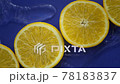 blue water flowing slow mo around citrus orange slices. natural Organic cosmetic 78183837