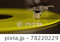yellow vinyl record spinning on turntable. vintage LP player in motion 78220229