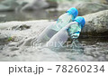 Summer scene: Ramune bottle chilled in Kawahara with lens flare 78260234