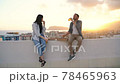 Couple picnic on the roof spending quarantine leisure time 78465963
