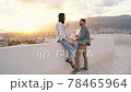 Couple picnic on the roof spending quarantine leisure time 78465964