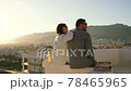 Couple picnic on the roof spending quarantine leisure time 78465965