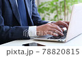 Office worker man operating a personal computer 78820815