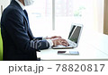 Office worker man operating a personal computer 78820817