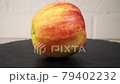 Close-up rotation of fresh red apple rotating in white background 79402232