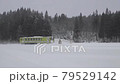 Akita inland line passing through a snow railroad crossing 79529142