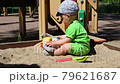 Adorable caucasian baby boy playing with car. 79621687