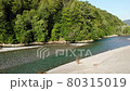 Mountain river, top aerial view. Drone flying over river in mountains. Wild nature. FullHD 80315019