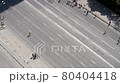 Russia, Novosibirsk city, 2021-05-30, Marathon on the street, people run along the road top view. 80404418