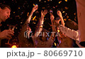 People dance and drink champagne 80669710