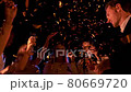 People dance and drink champagne 80669720
