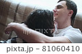 Happy young lovers enjoy time spending together at home 81060410