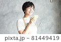 Beautiful woman drinking a smoothie 81449419
