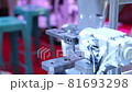 robot arm pick and place part in manufacturing process. 81693298