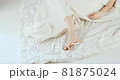 Woman cant find comfortable place in bed, tosses and turns over. Body breaking. Restless sleep. 81875024