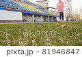 Little girl is jumping rope 81946847