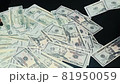Throwing money - bundle of dollars, video on black background. 81950059