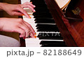 Caucasian girl playing piano two-handed. Close up.  82188649